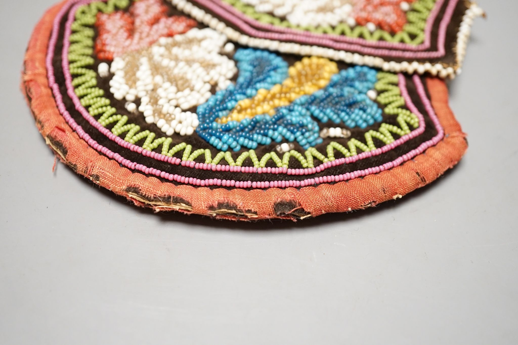 A 19th Century native American-Indian Haudenosaunee / Iroquois beadwork and silk velvet purse, 15cm